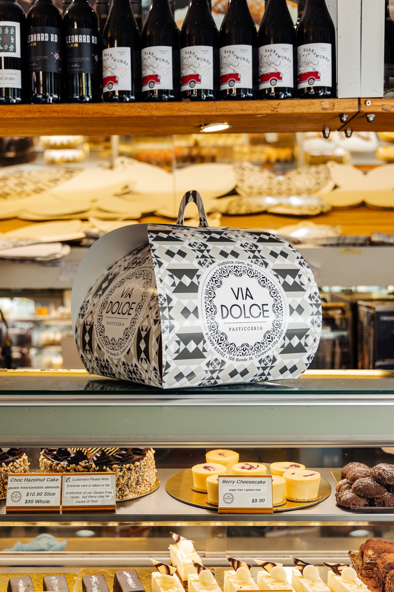 A Via Dolce celebration cake with a chocolate greeting plaque